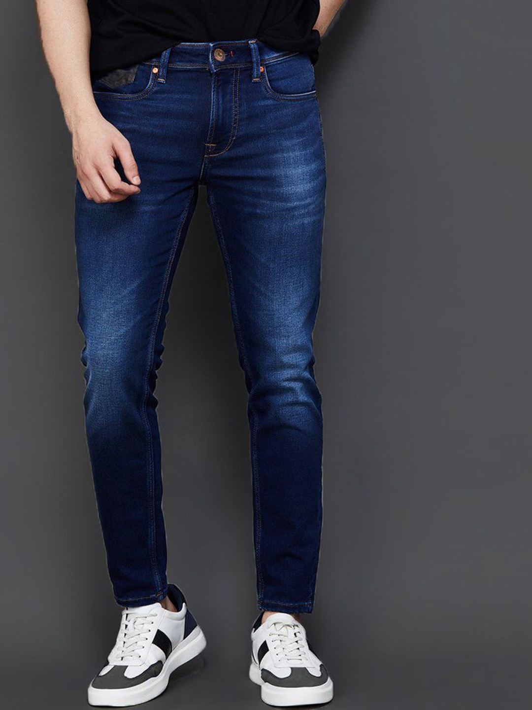 

fineblu Men Slim Fit Low Distress Heavy Fade Stretchable Jeans, Blue
