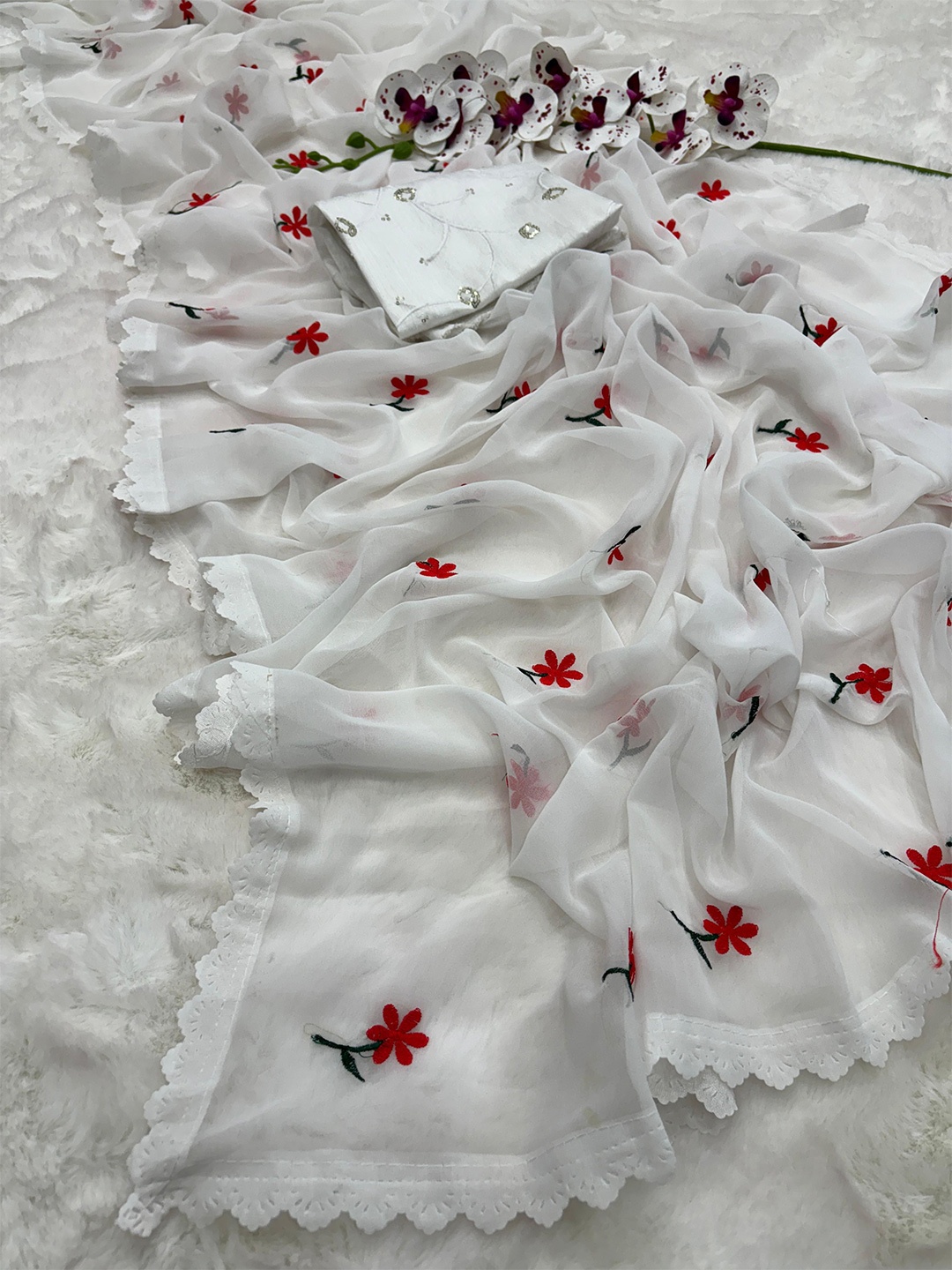 

Moda Rapido Floral Embroidered Pure Georgette Saree, White