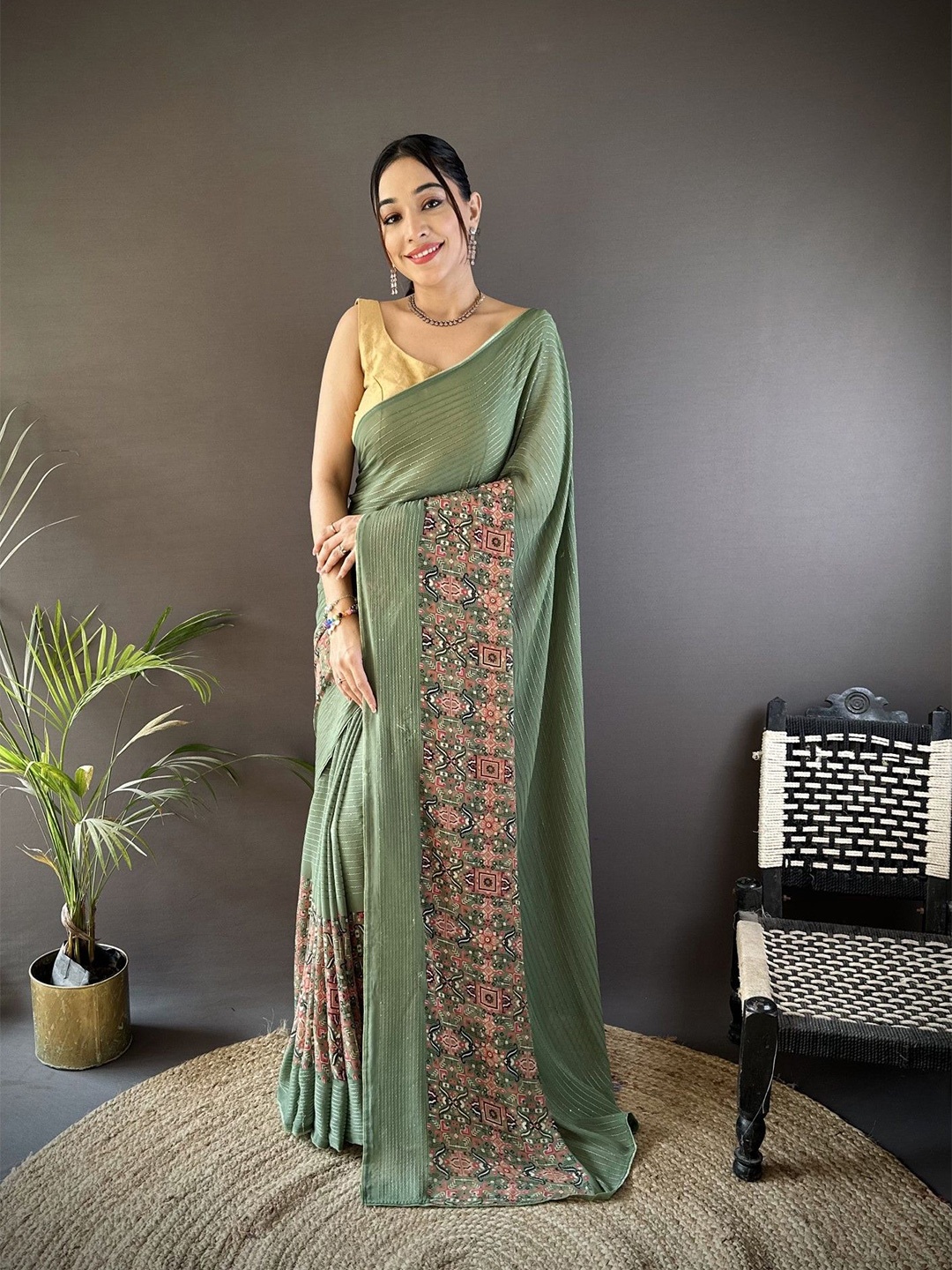 

LeeliPeeri Designer Striped Sequinned Poly Georgette Saree, Green
