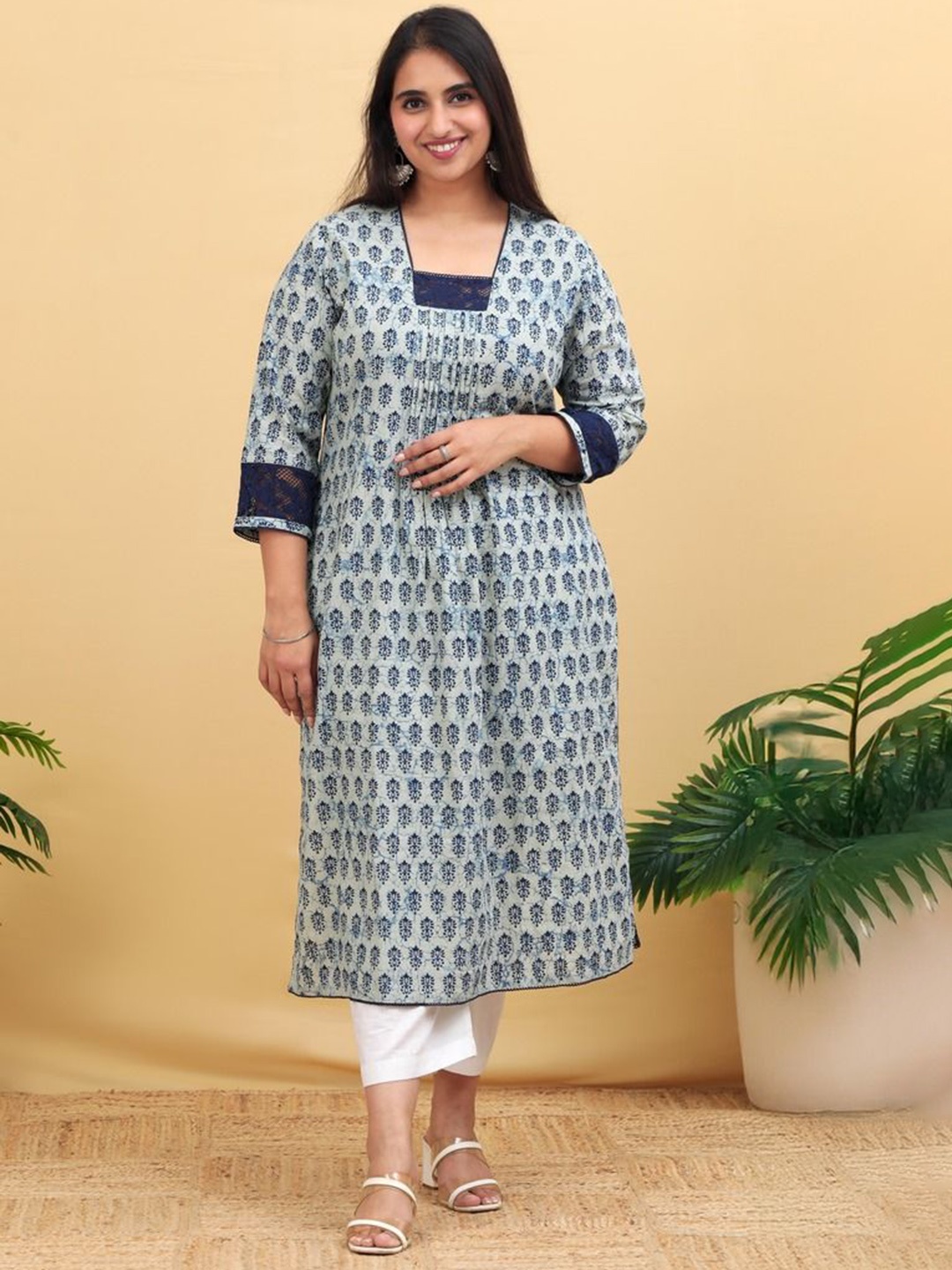 

Amaya Women Geometric Printed Mirror Work Kurta, Blue