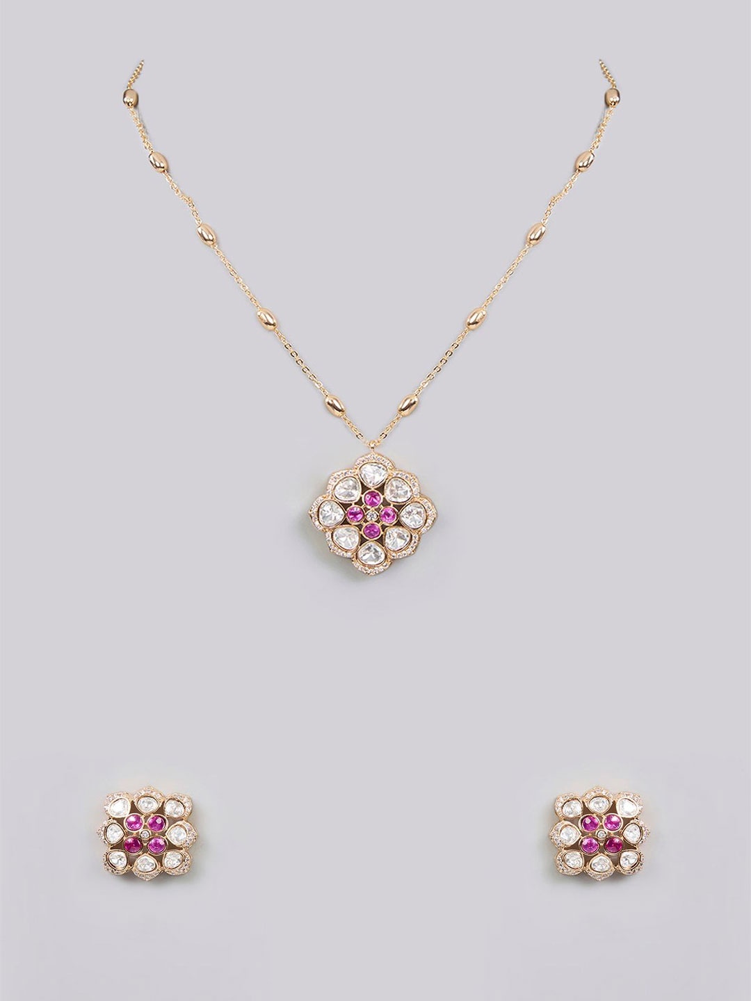 

AURAA TRENDS Gold-Plated Stone-Studded Jewellery Set