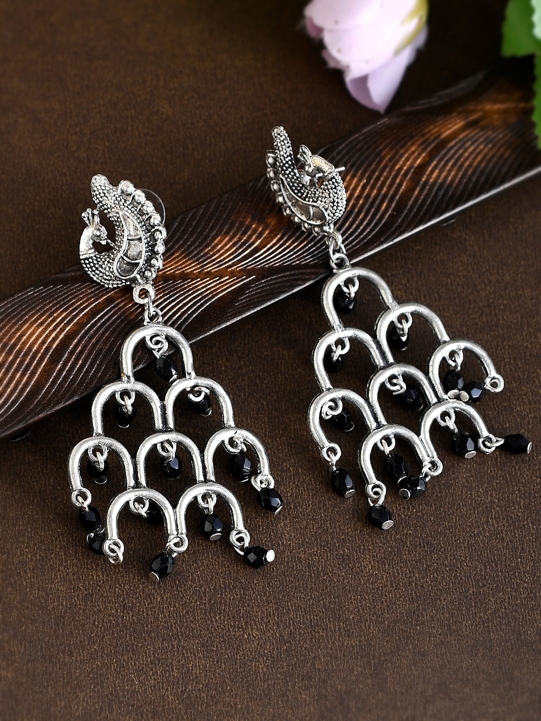 

Shoshaa Women Black & Silver-Plated oxidised Peacock Shaped Drop Earrings