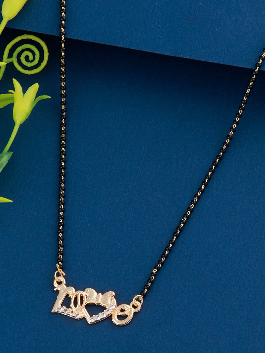 

Silver Shine Gold-Plated White Stone-Studded Black Beaded Love-Charm Mangalsutra