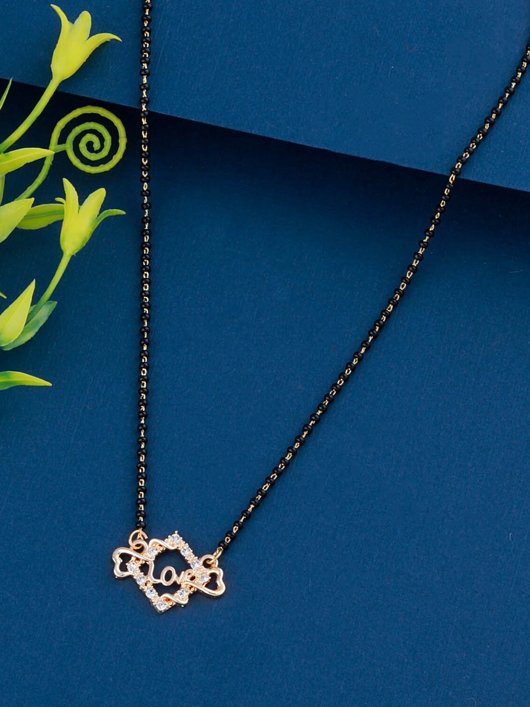 

Silver Shine Gold-Plated & Black Beaded Stones Studded Mangalsutra