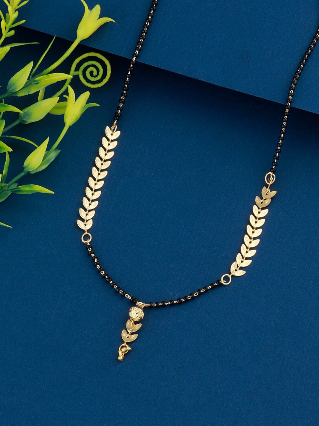 

Silver Shine Women Gold-Plated Black Beaded Mangalsutra