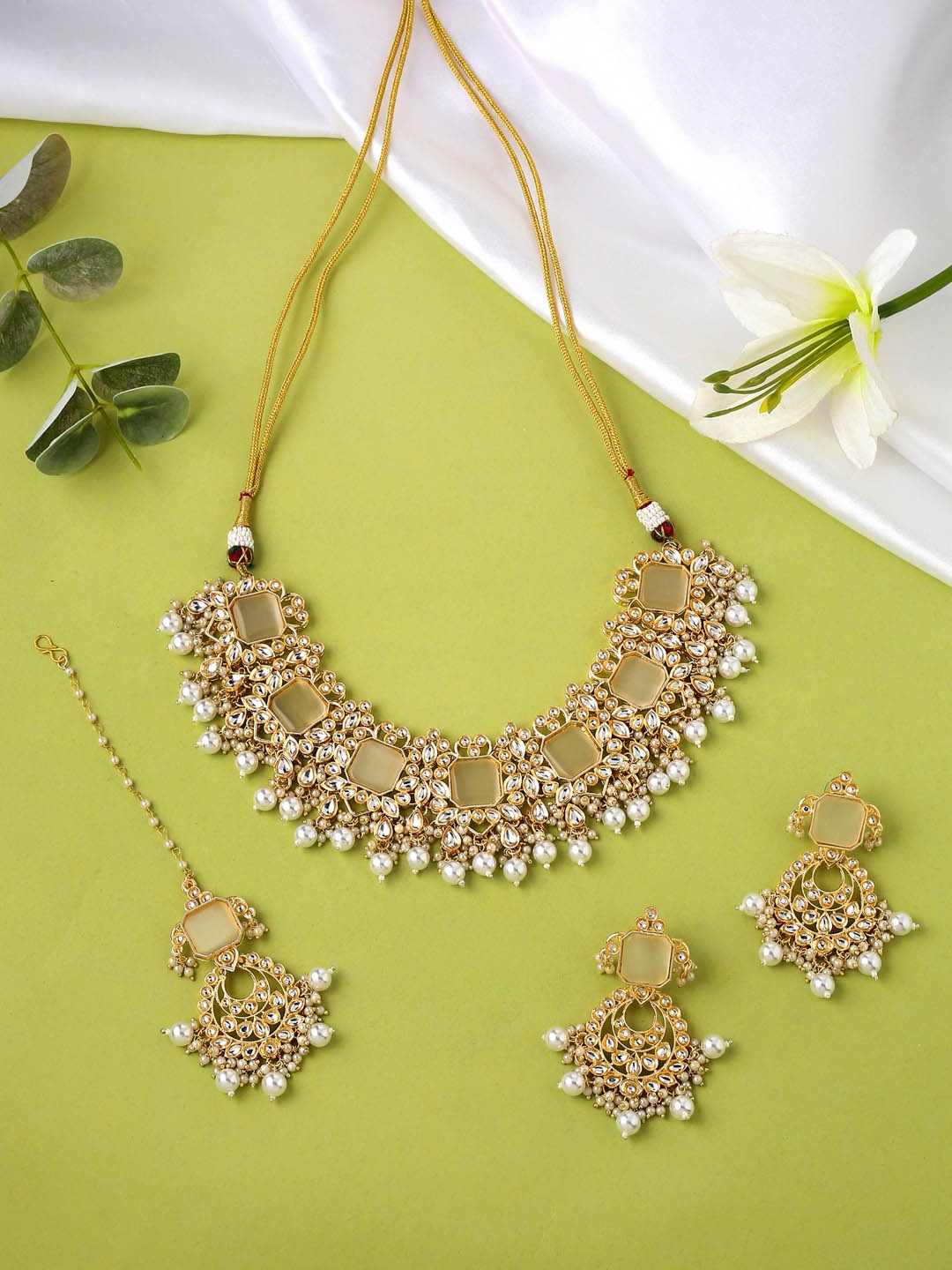 

Yellow Chimes Gold-Plated Kundan Studded Pearl Beaded Necklace Set