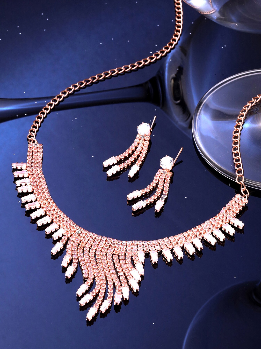 

Yellow Chimes Rose Gold-Plated Crystal Studded Tasselled Jewellery Set