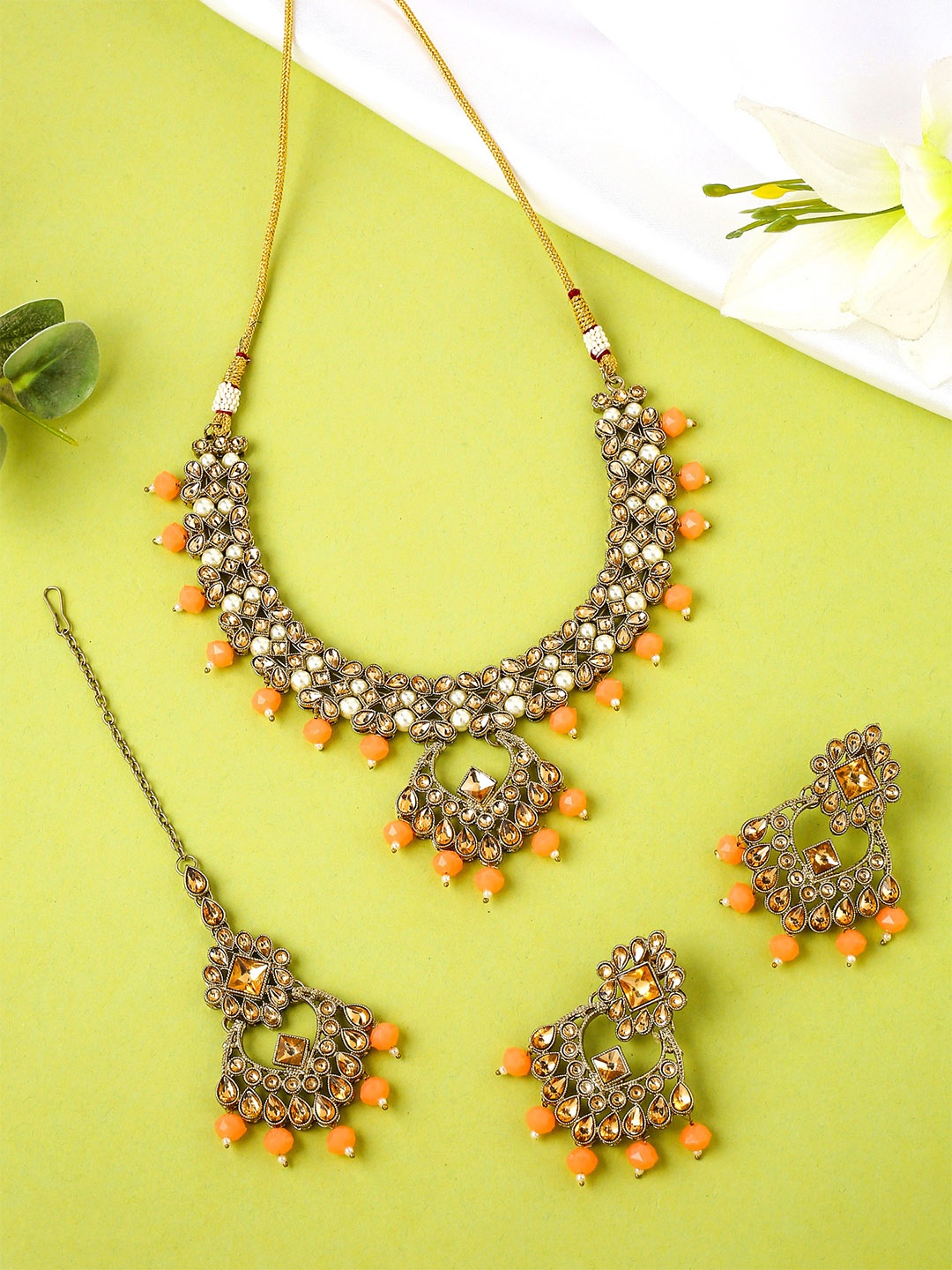 

Yellow Chimes Gold-Plated Peach & White Beads Beaded Jewellery Set