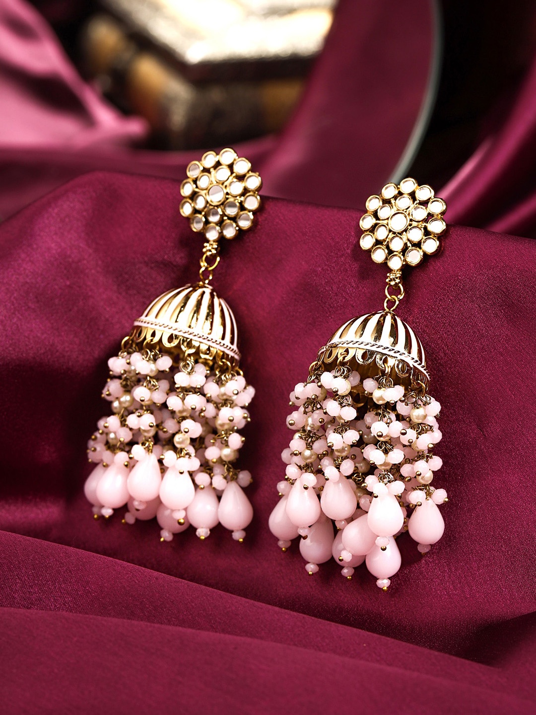 

Yellow Chimes Gold-Plated Pink Enamelled Jhumka Earrings