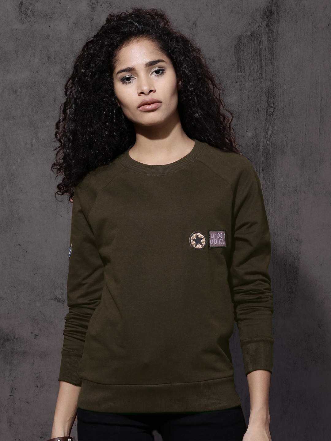 

Roadster Women Olive Green Solid Sweatshirt