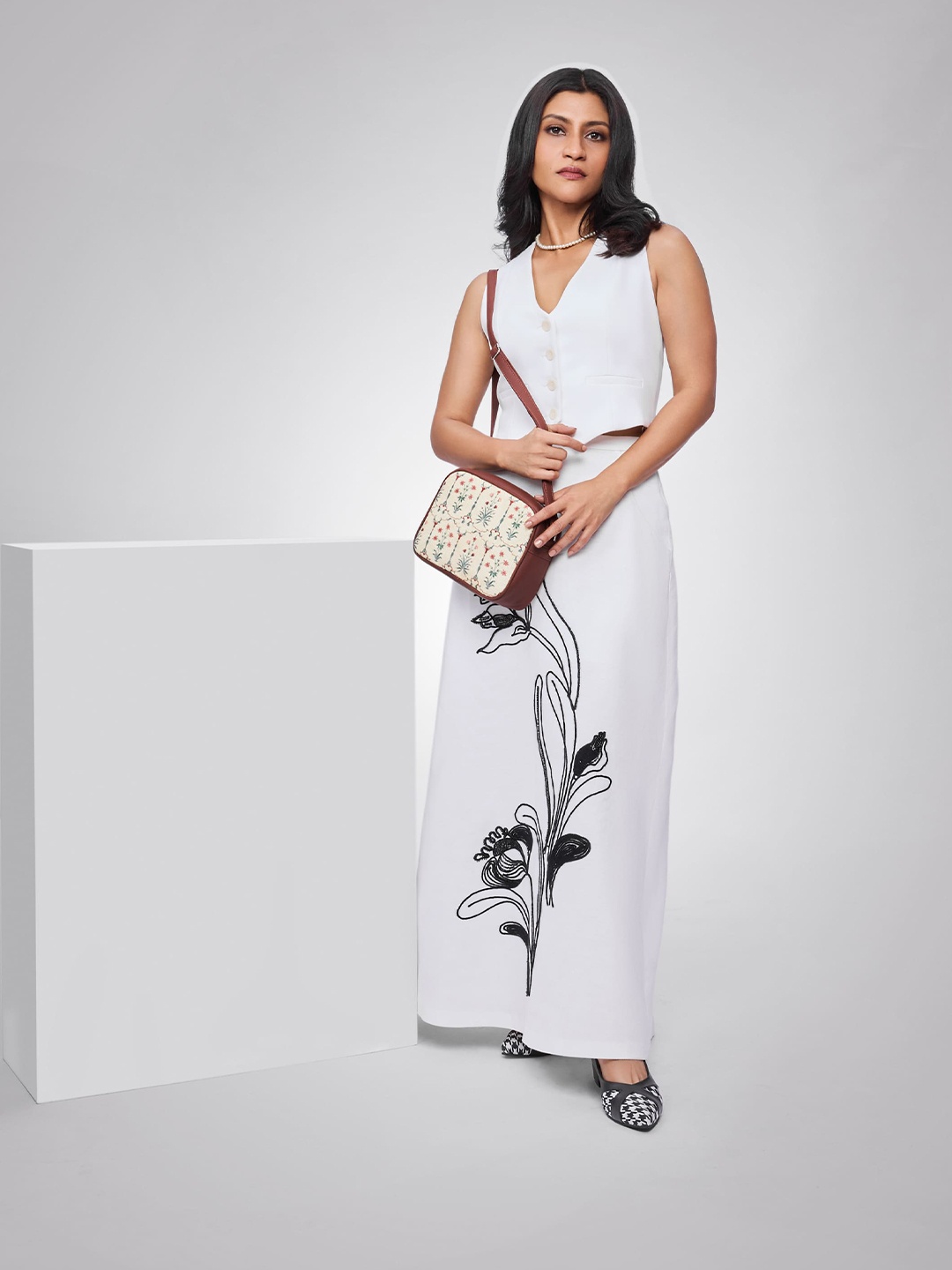 

ZOUK White Ethnic Motifs Printed Structured Sling Bag