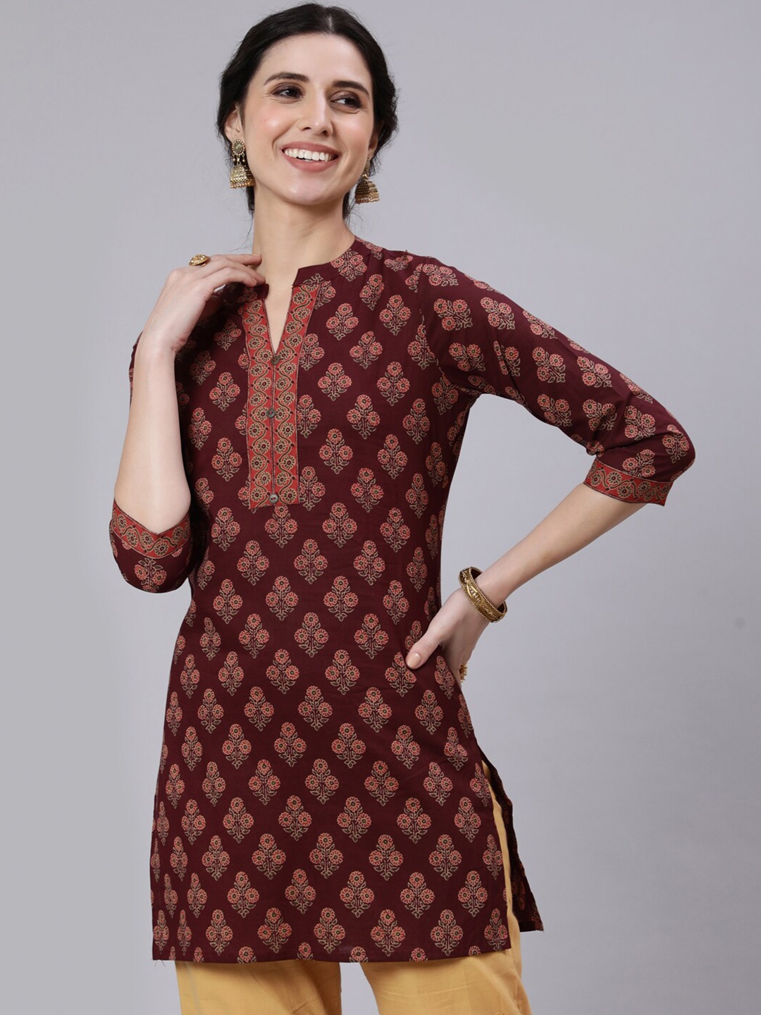 

Nayo Women Burgundy And Yellow Ethnic Motifs Printed Cotton Straight Tunic