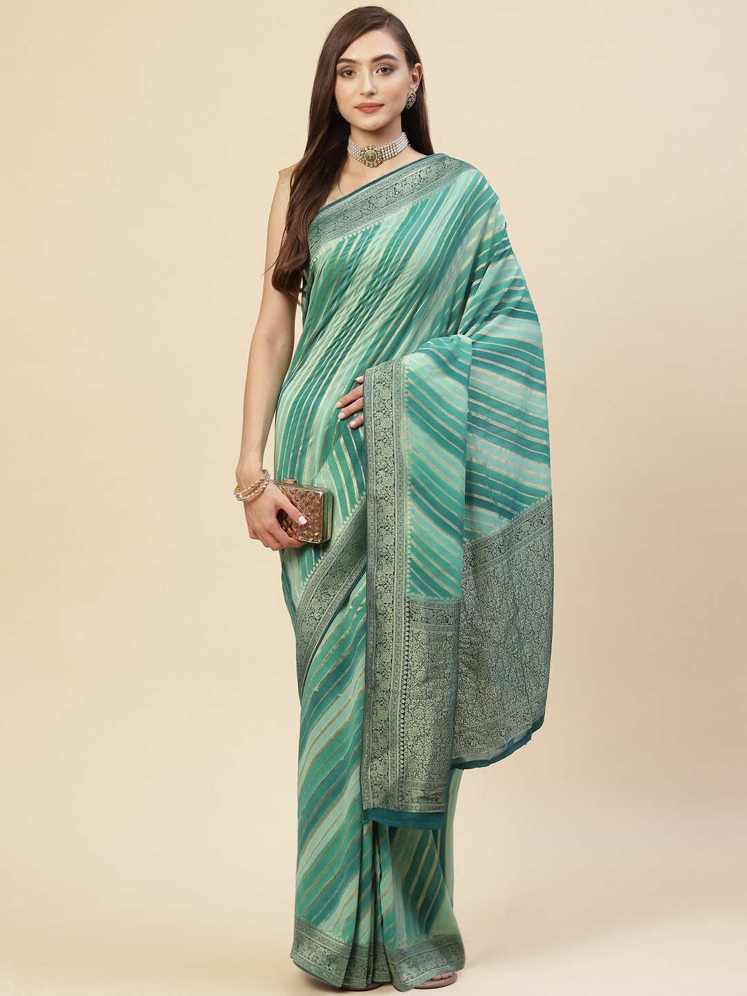 

Meena Bazaar Sea Green & Gold-Toned Woven Design Zari Art Silk Banarasi Saree