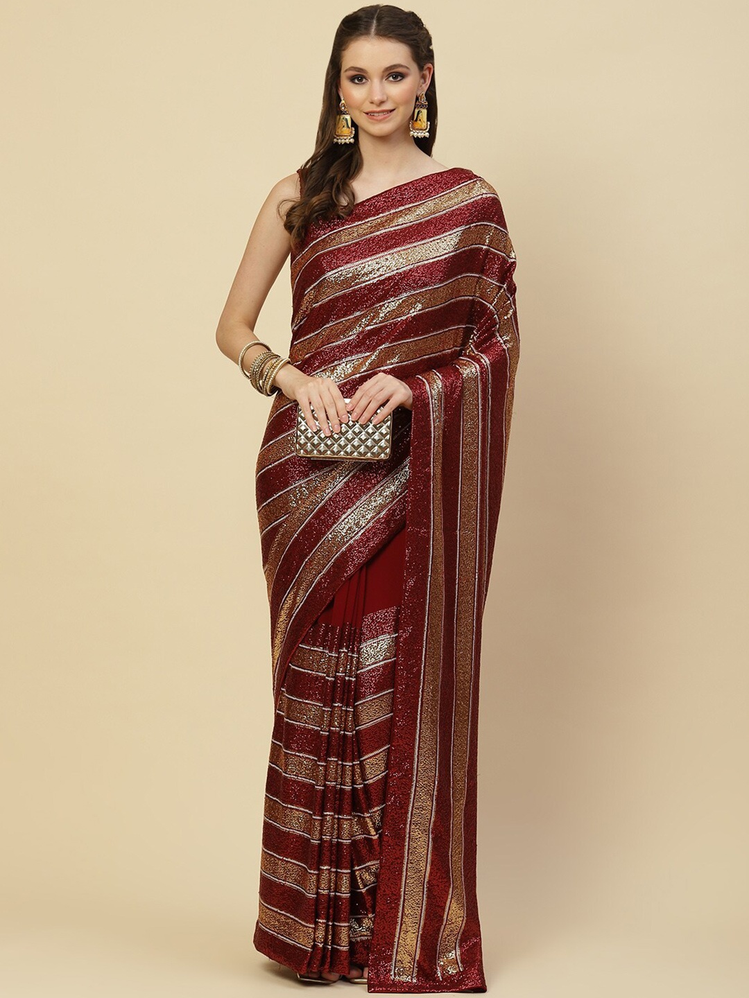 

Meena Bazaar Maroon & Gold-Toned Embellished Zari Saree