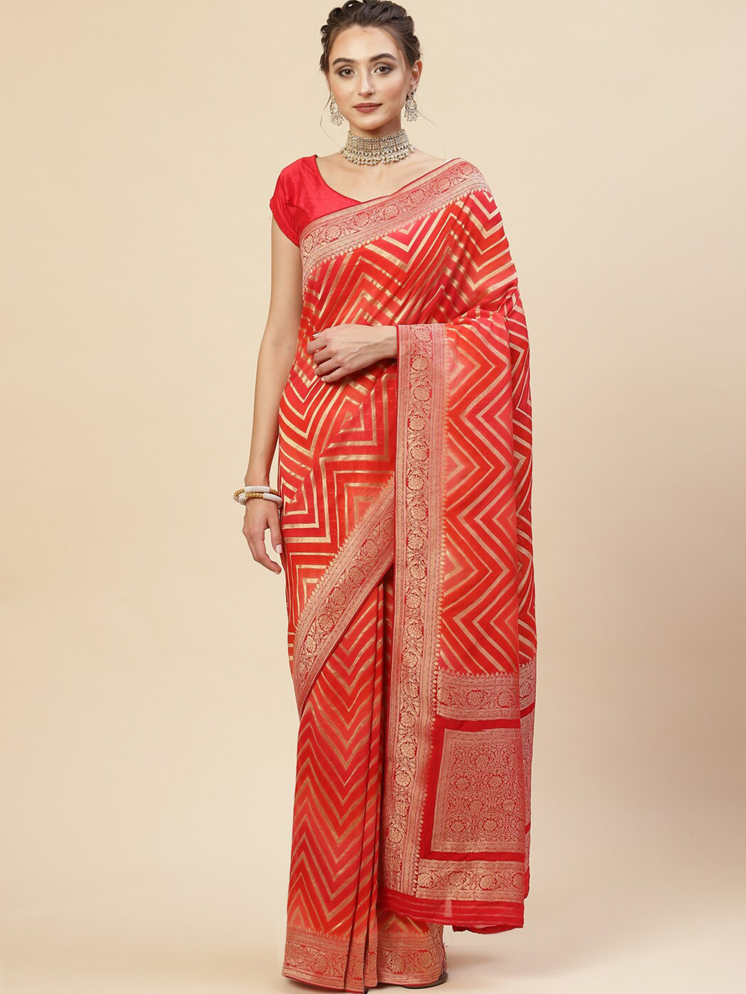 

Meena Bazaar Orange & Gold-Toned Woven Design Zari Saree