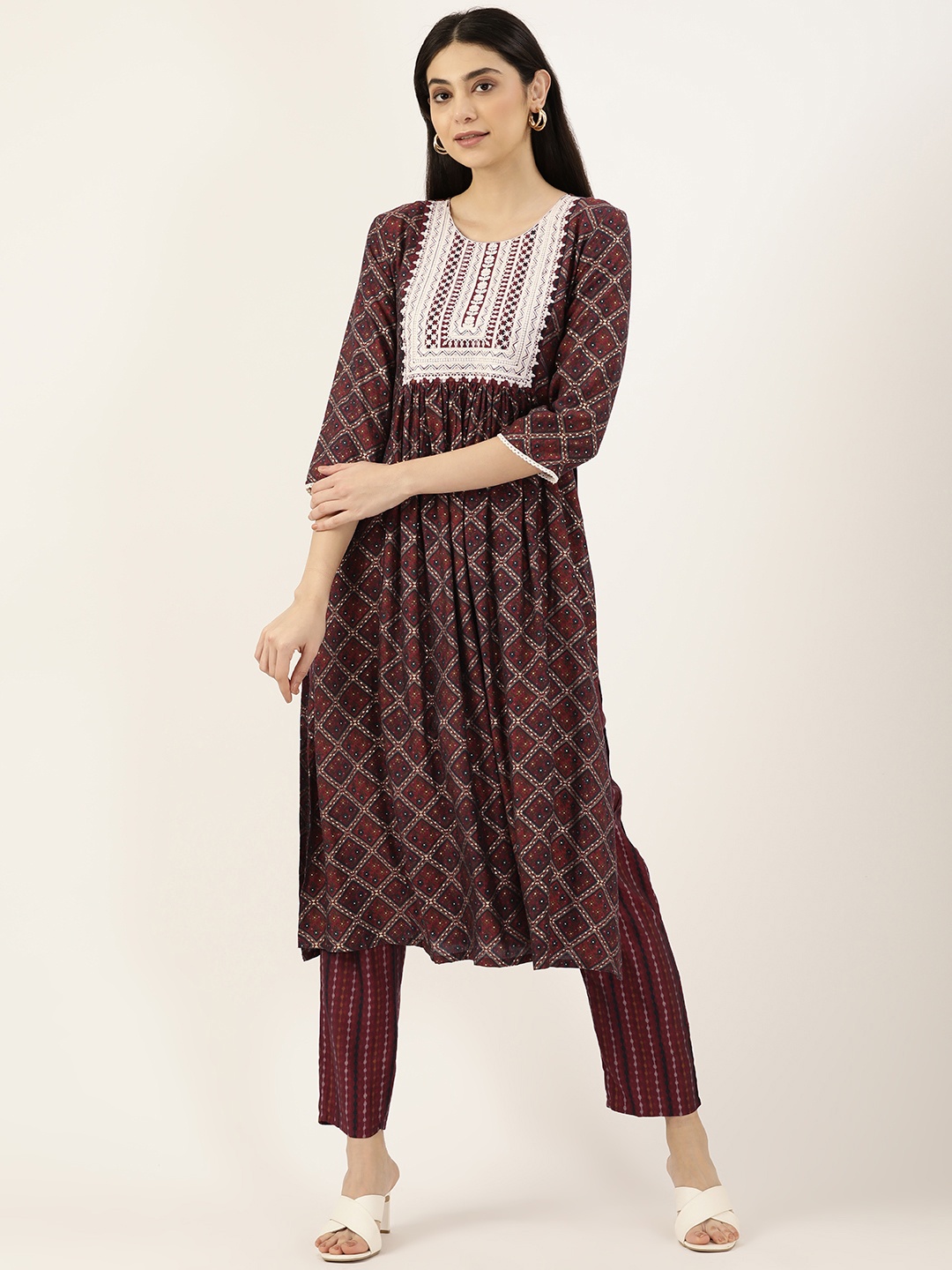 

SWAGG INDIA Women Maroon Ethnic Motifs Embroidered Pleated Thread Work Kurta with Trousers