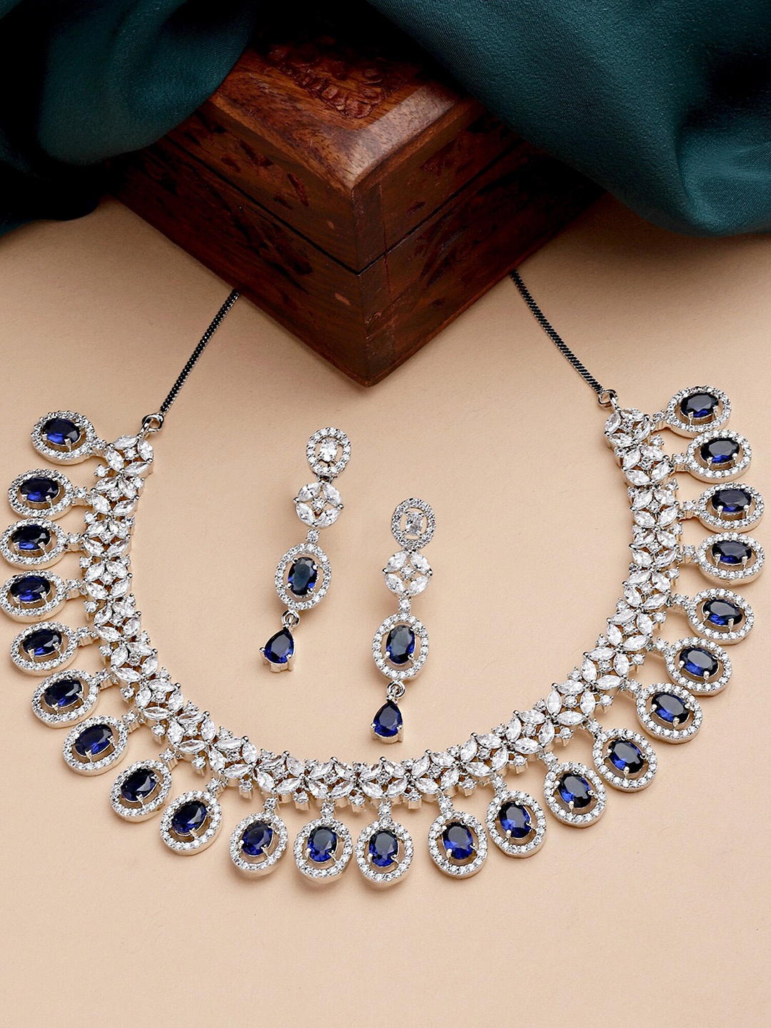 

KARATCART Silver-Plated Blue American Diamond Studded Jewellery Set