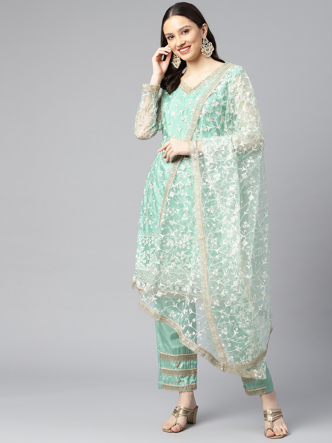 

Readiprint Fashions Green Embroidered Semi-Stitched Dress Material