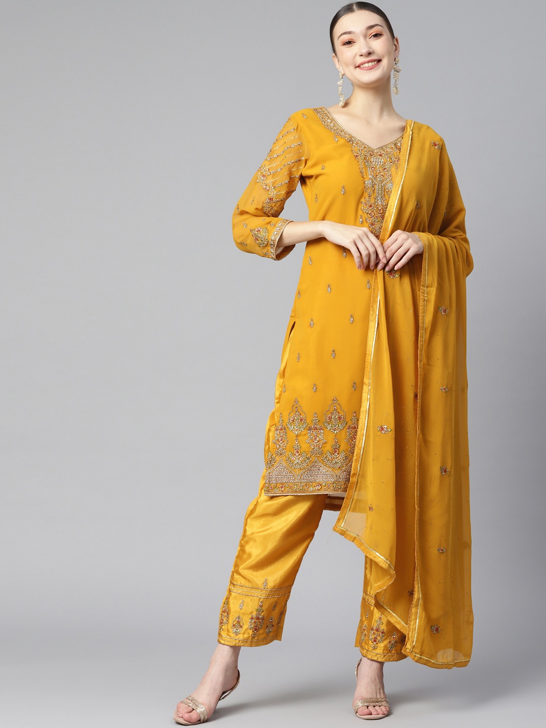 

Readiprint Fashions Mustard Yellow Embroidered Semi-Stitched Dress Material