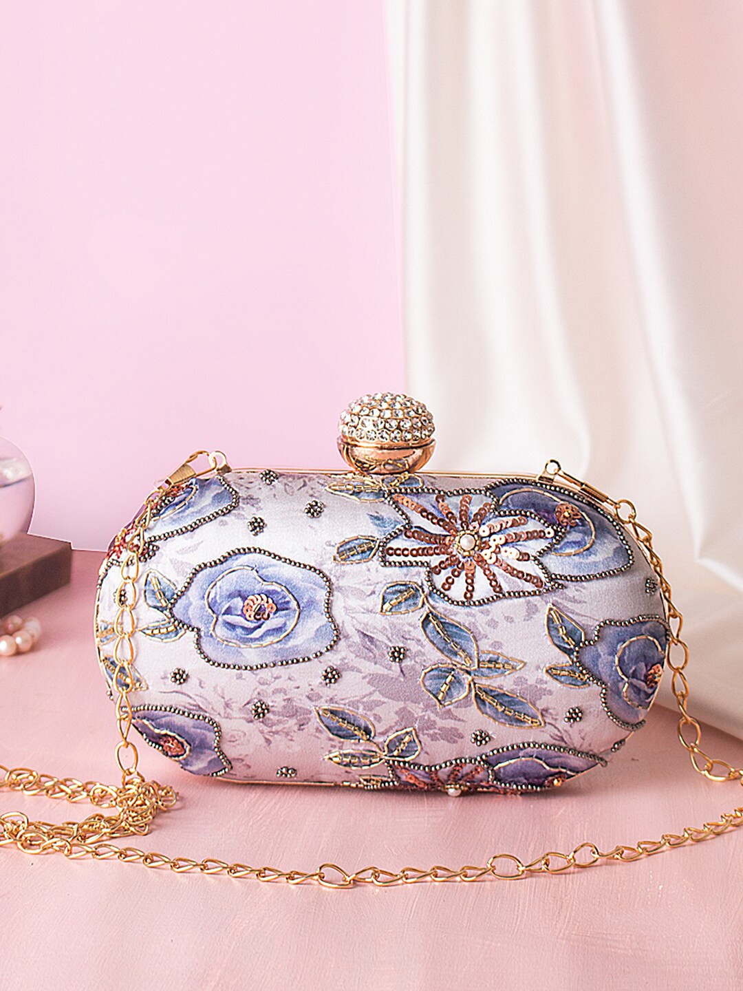 

Swisni Blue & Gold-Toned Embellished Potli Clutch