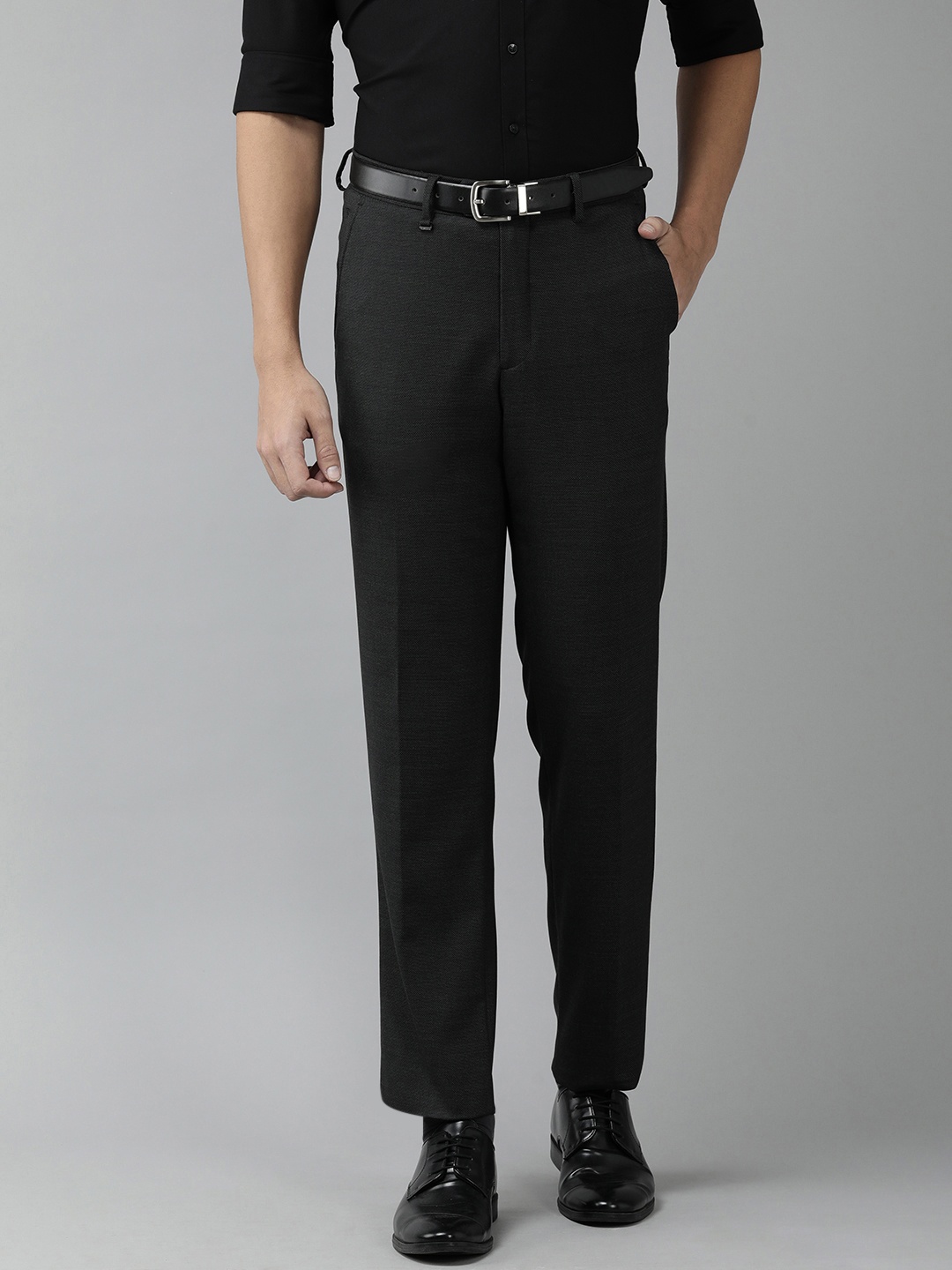 

Van Heusen Men Black Textured Low-Rise Trousers