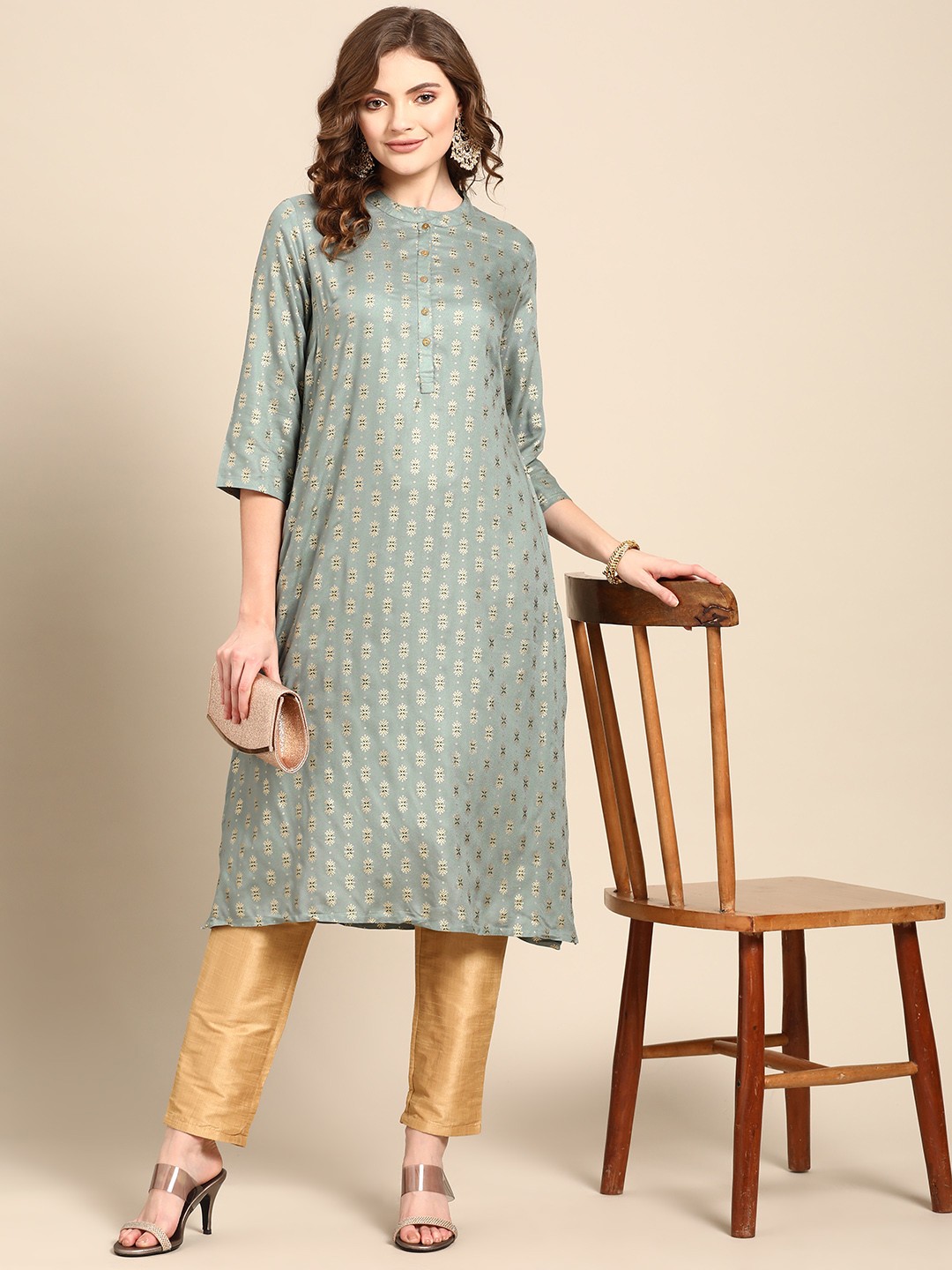 

Sangria Women Sea Green & Golden Ethnic Motifs Kurta