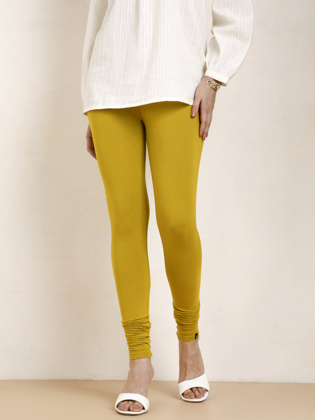 TWIN BIRDS Women Mustard Yellow Solid Churidar-Length Leggings