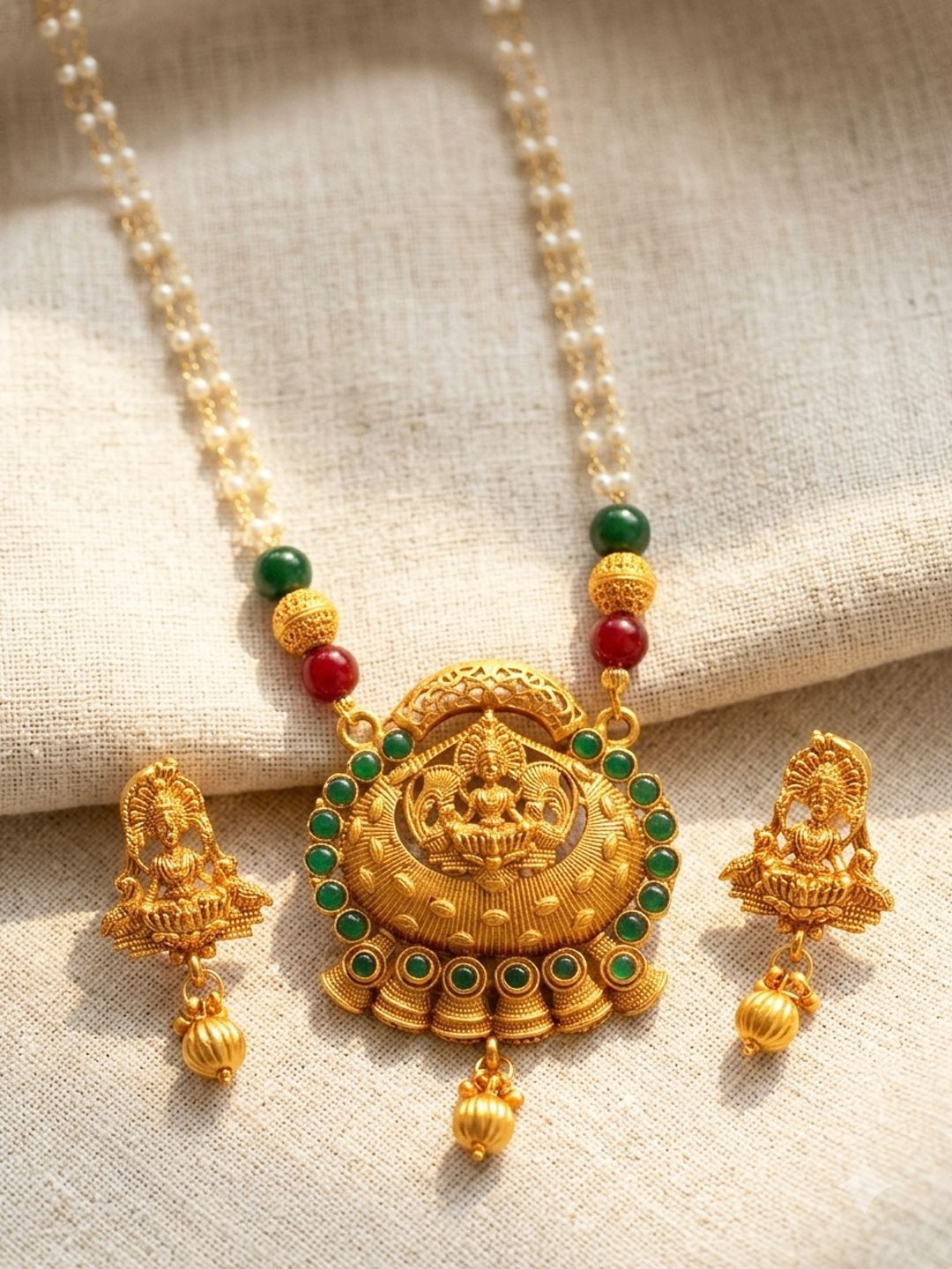 ANIKAS CREATION Gold-Plated Green Stone-Studded Jewellery Set