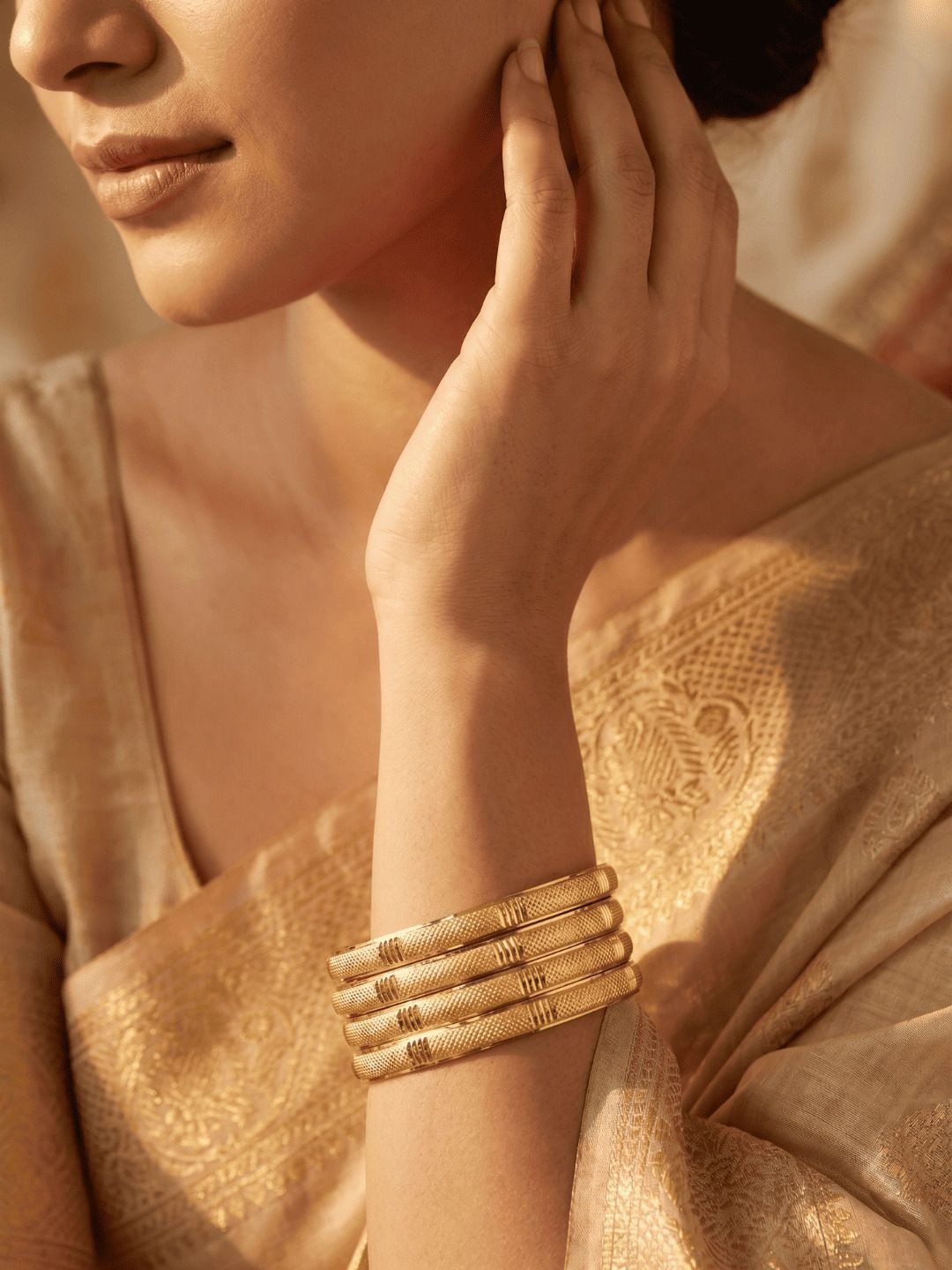 Jewar Mandi Set Of 4 Gold-Plated Bangles