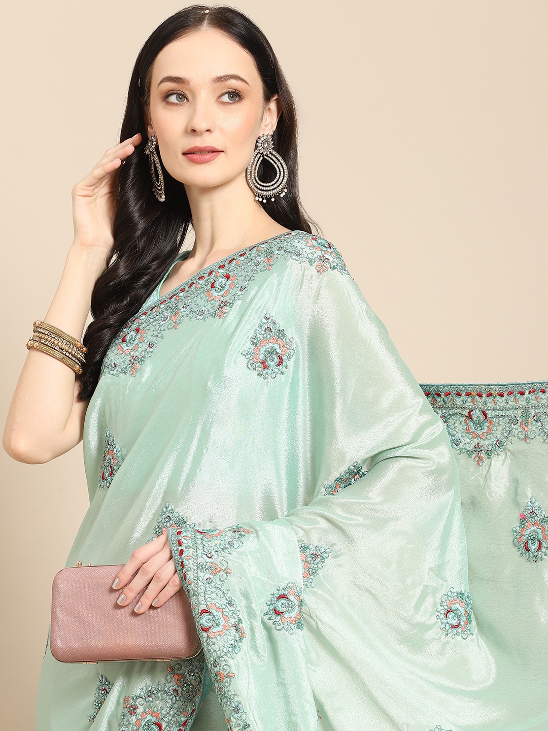

Nimayaa Sea Green Ethnic Motifs Embroidered Satin Saree