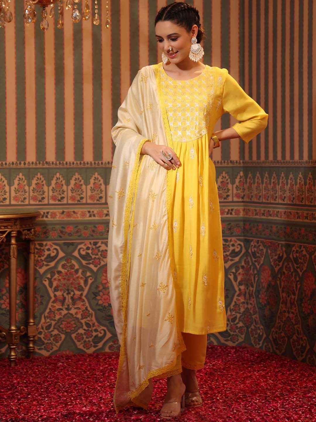 

SCAKHI Women Yellow Floral Embroidered Pleated Chanderi Silk Kurta with Trousers & With Dupatta