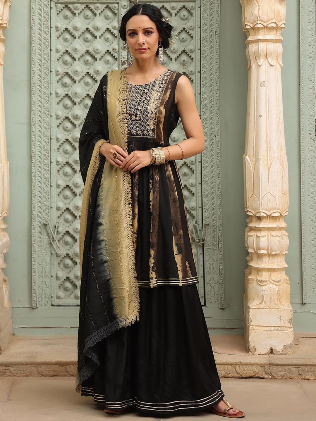 

SCAKHI Women Black Dyed Pleated Thread Work Kurti with Sharara & With Dupatta