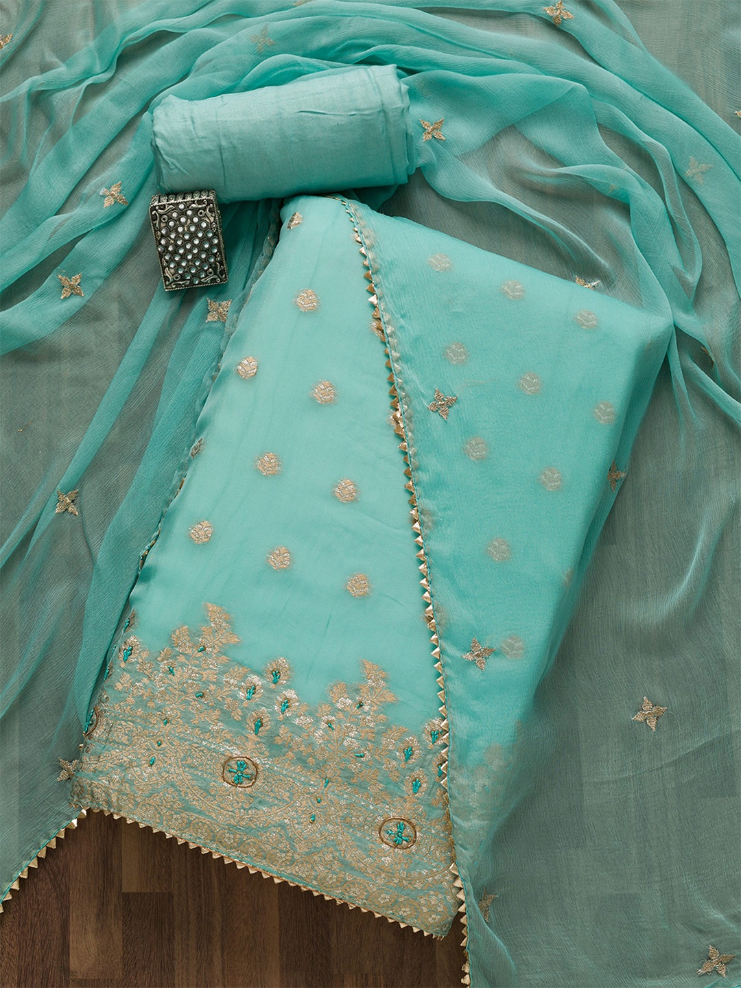 

Koskii Sea Green & Gold-Toned Art Silk Unstitched Dress Material