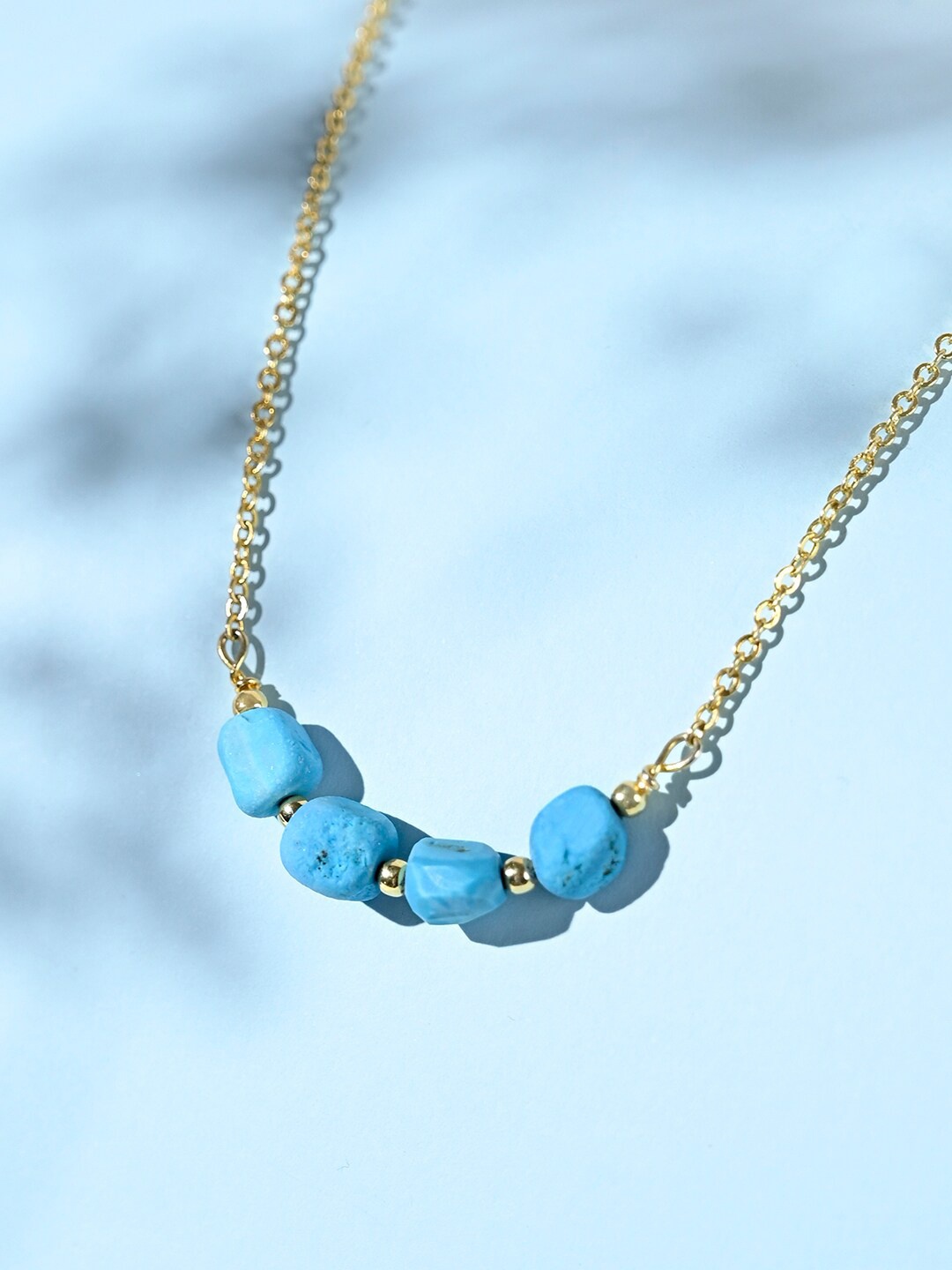 

March by FableStreet Women Gold-Toned & Blue Brass Gold-Plated Chain