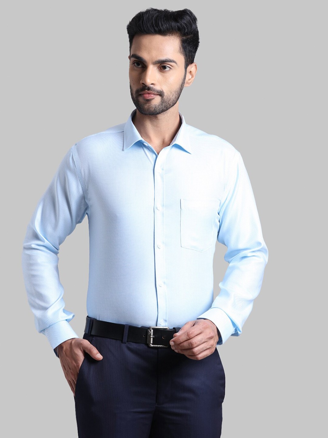 

Park Avenue Men Blue Solid Slim Fit Formal Shirt