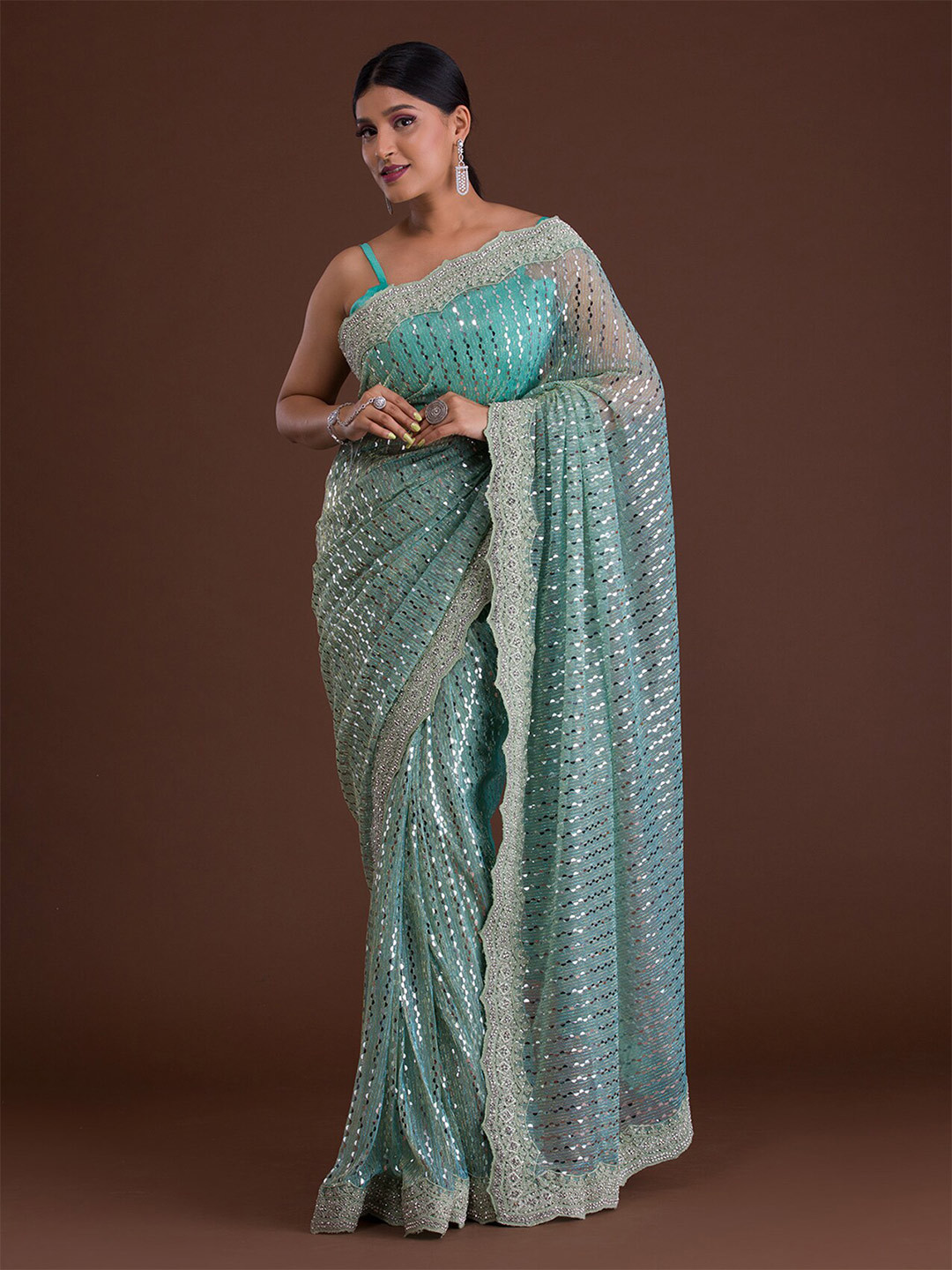

Koskii Green & Silver-Toned Striped Mirror Work Supernet Saree
