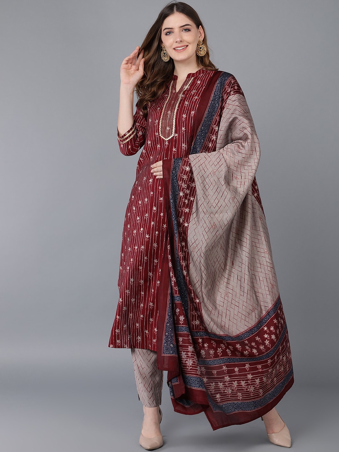 

AHIKA Women Burgundy Floral Printed Kurta with Trouser & With Dupatta Set