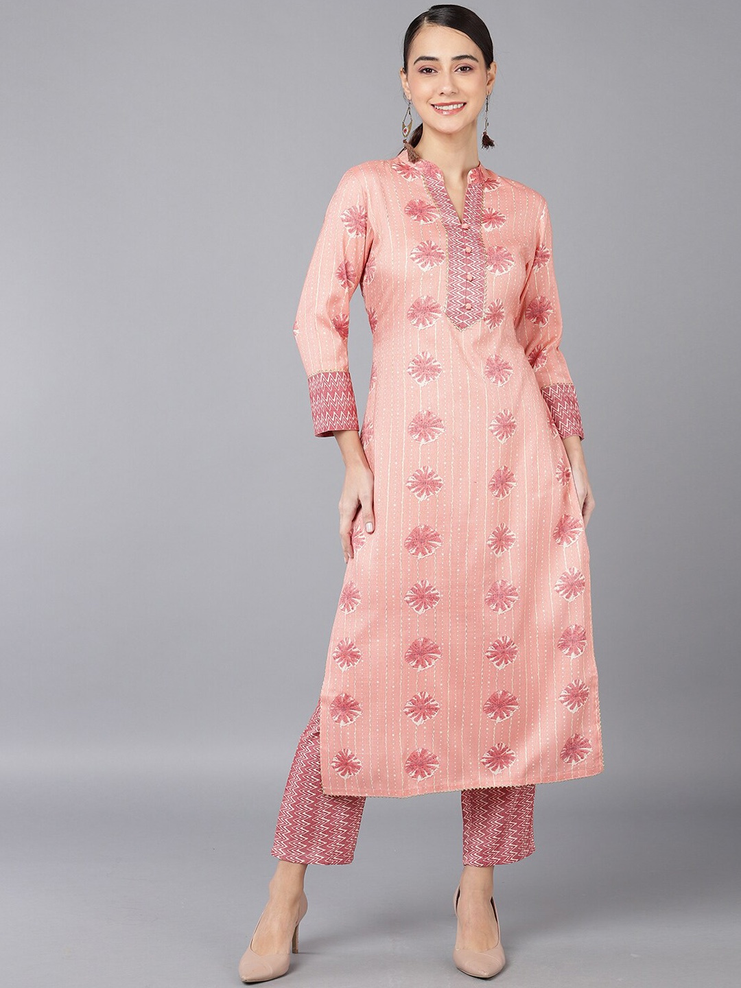 

AHIKA Women Orange Ethnic Motifs Printed Cotton Blend Kurta with Trousers