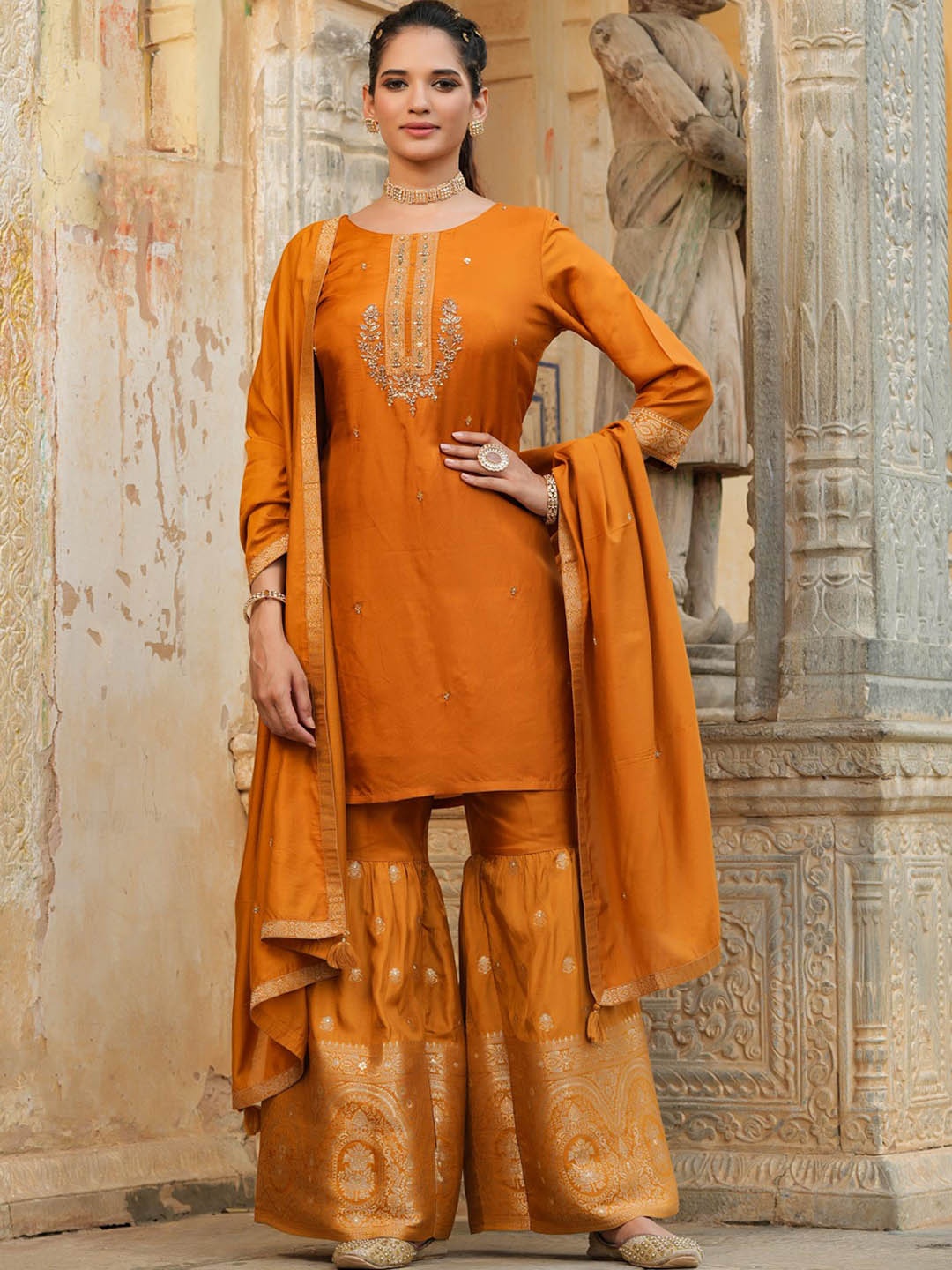 

SCAKHI Women Orange Ethnic Motifs Yoke Design Beads and Stones Pure Silk Kurti with Sharara & With Dupatta