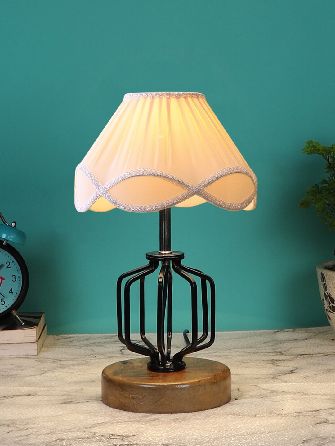

Devansh Off White Solid Table Lamps