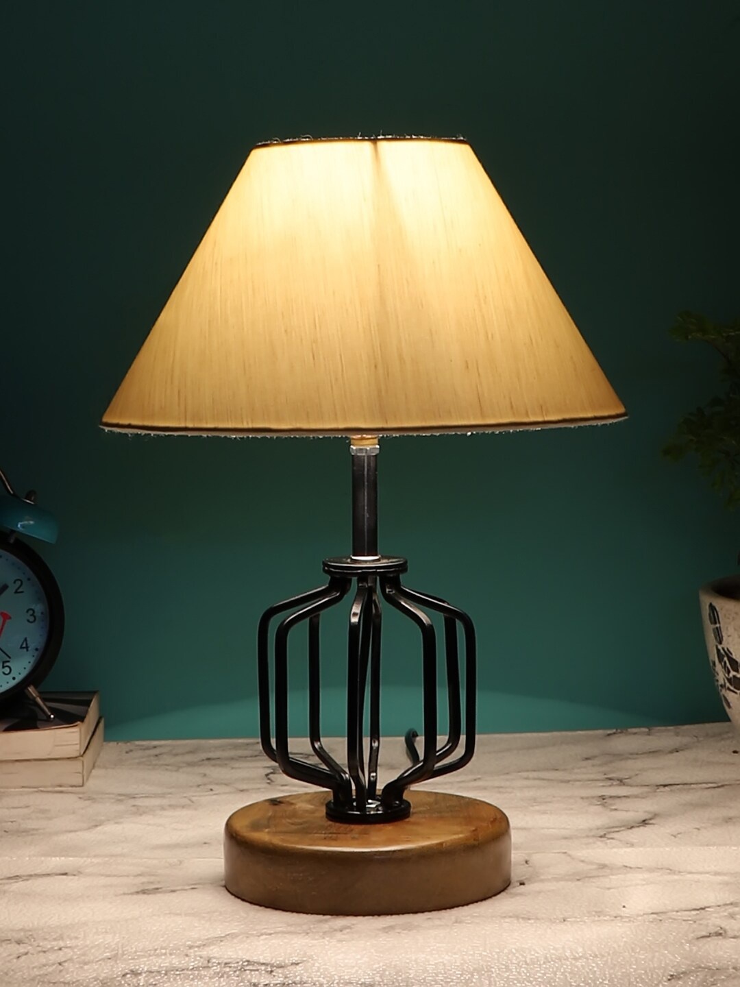 

Devansh Off White Solid Table Lamp