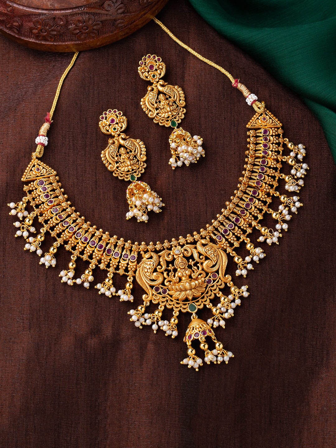 

Estele Gold plated CZ Divine Lakshmi Ji Bridal Necklace set with Pearls for Women