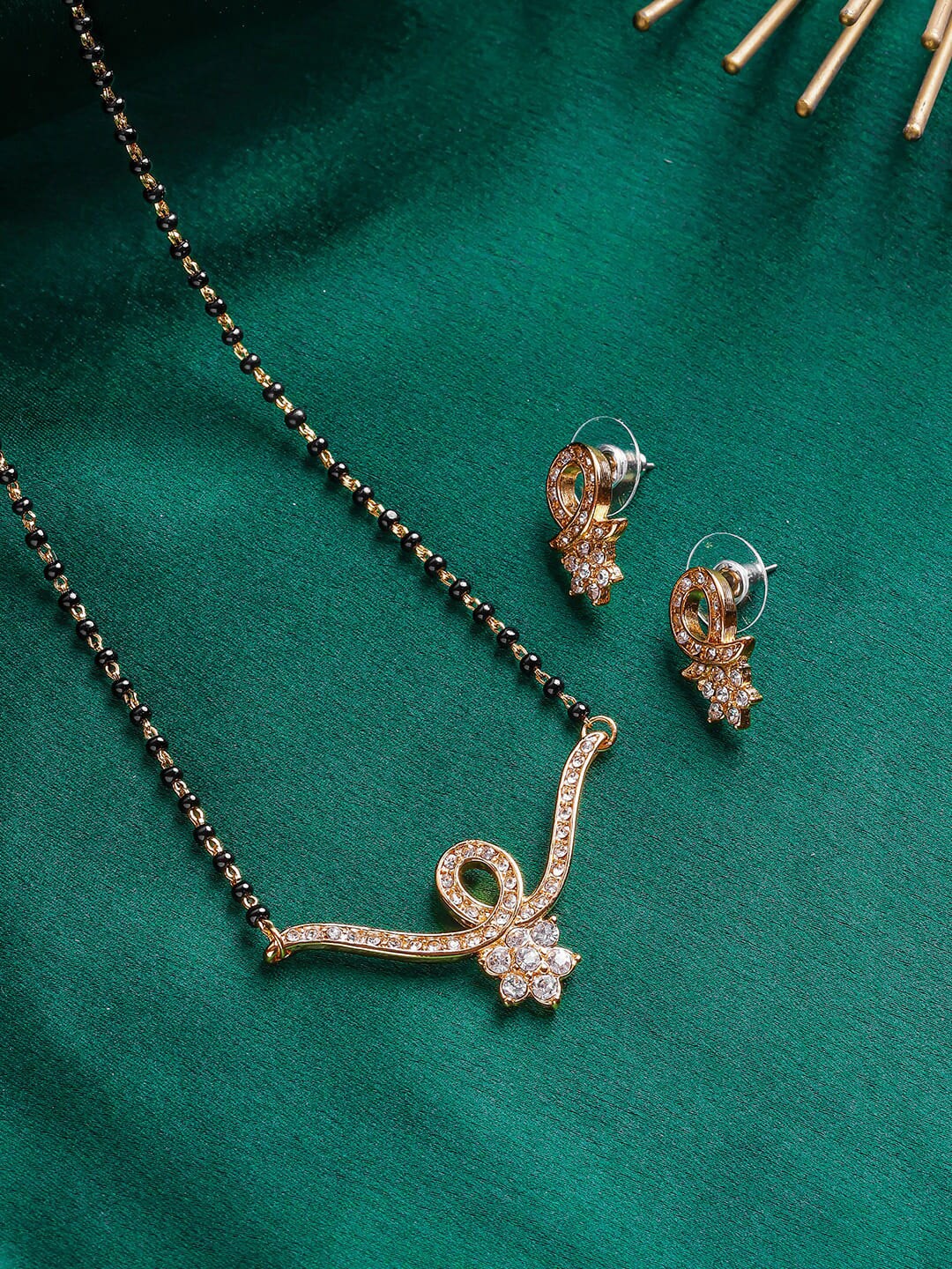 

Estele Gold Plated Curved Floral Mangalsutra Necklace Set