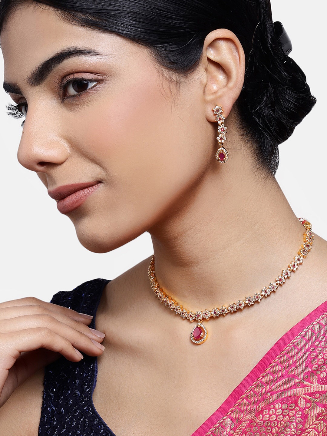 

Estele Gold Plated CZ Floral Line Bridal Necklace Set With Ruby Crystals