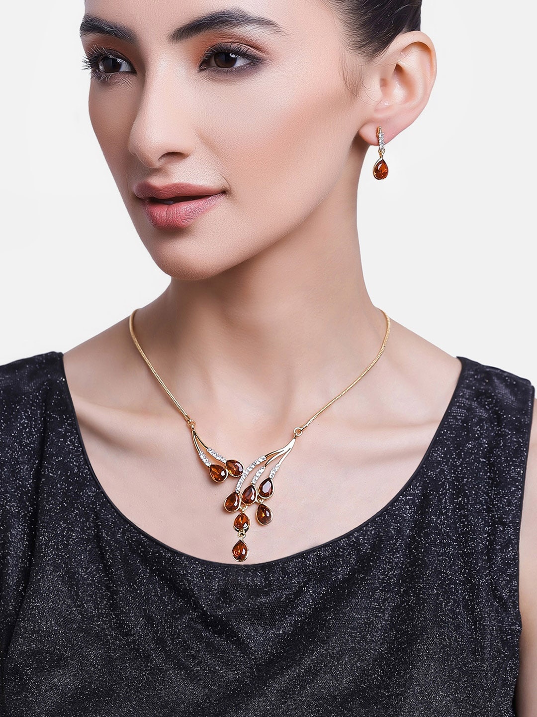 

Estele Gold-Plated & Maroon Crystal Studded Jewellery Set