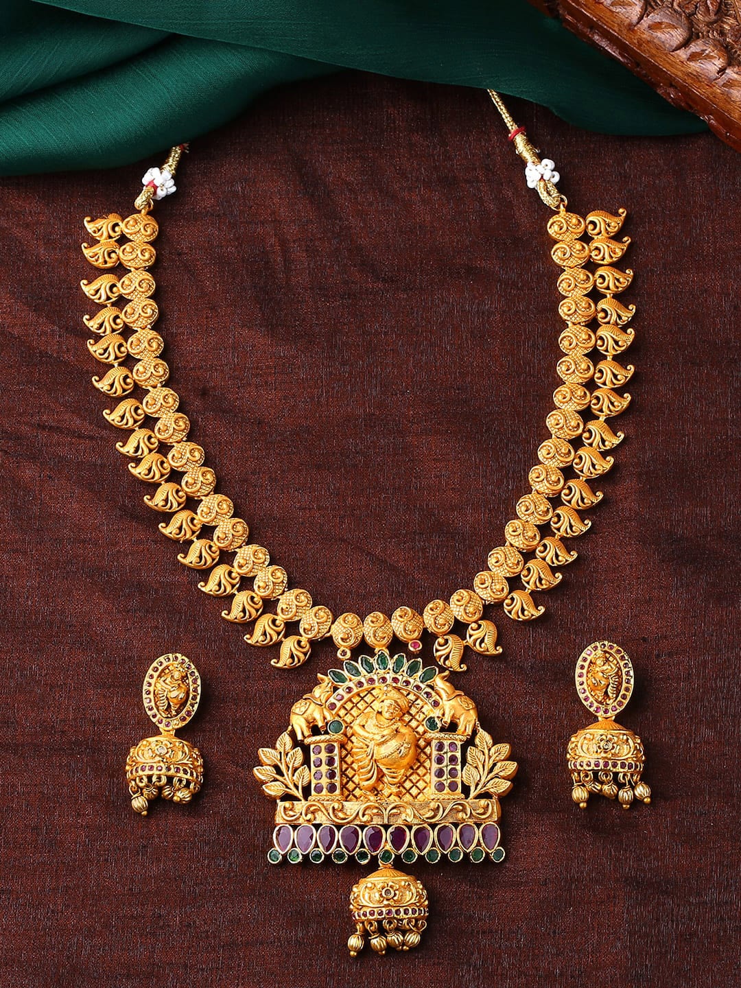 

Estele Gold Plated CZ Lord Krishna Embellished with Elephants Necklace Set