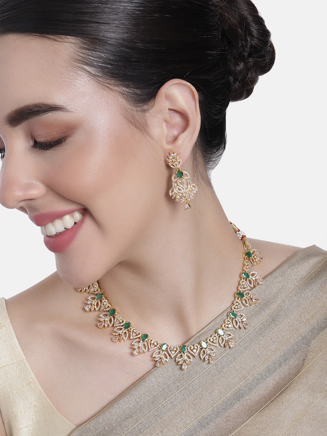 

Estele Gold Plated CZ Dazzling Designer Necklace Set with Green Stones