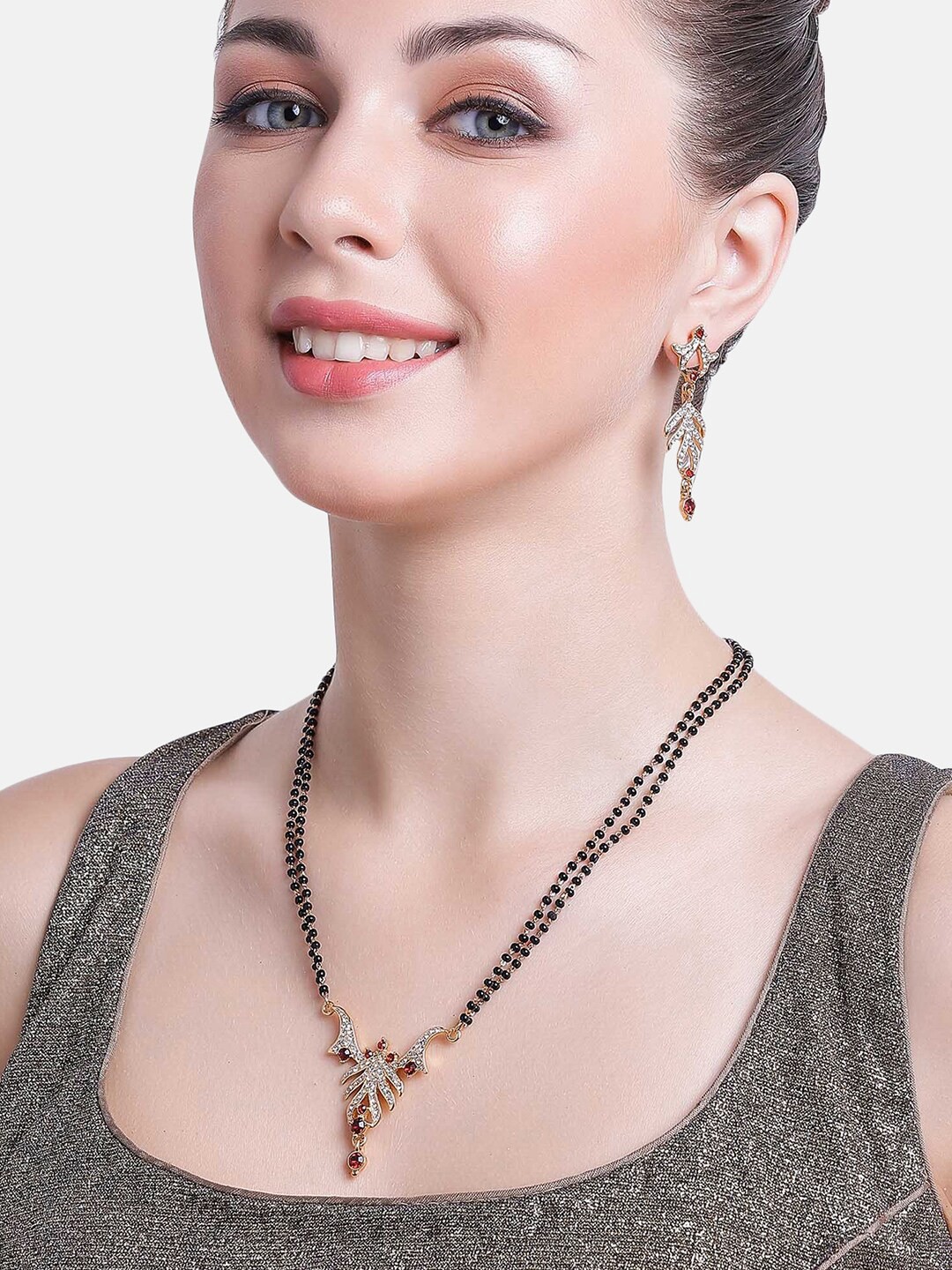 

Estele Gold Plated Leafy Designer Mangalsutra Set with Austrian Crystals for Women