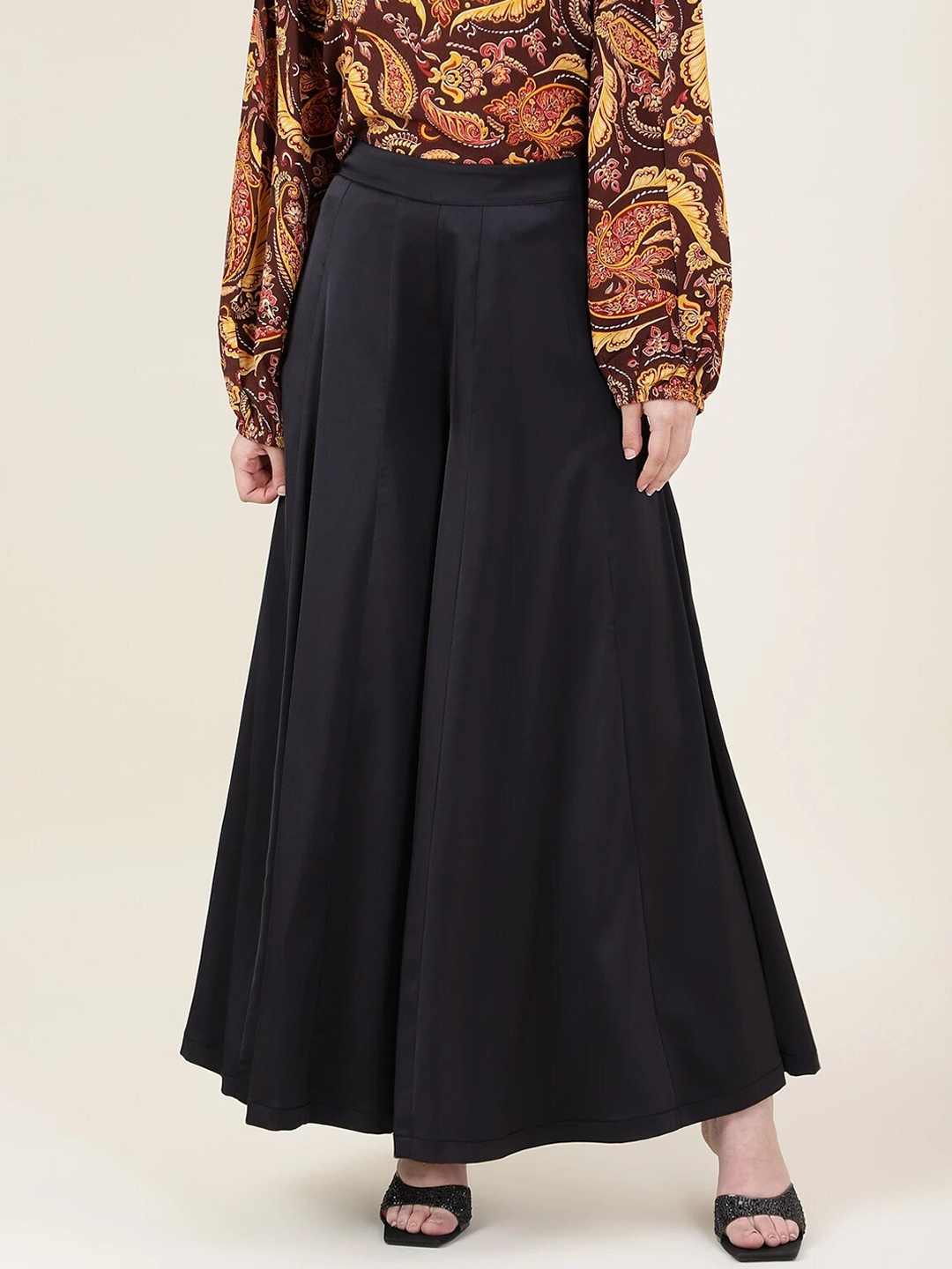 

Marks & Spencer Women Black Solid Flared Palazzos