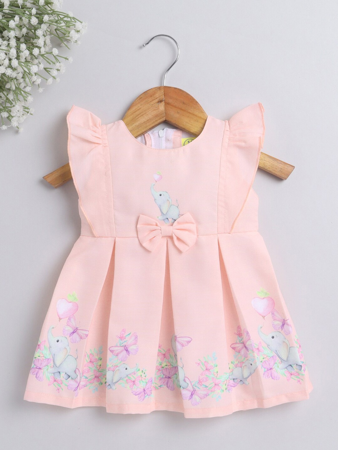 

The Magic Wand Girls Peach-Coloured Conversational Printed Dress